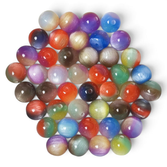 Lot de 10 perles en résine bicolores effet œil de chat pailleté – 10 mm