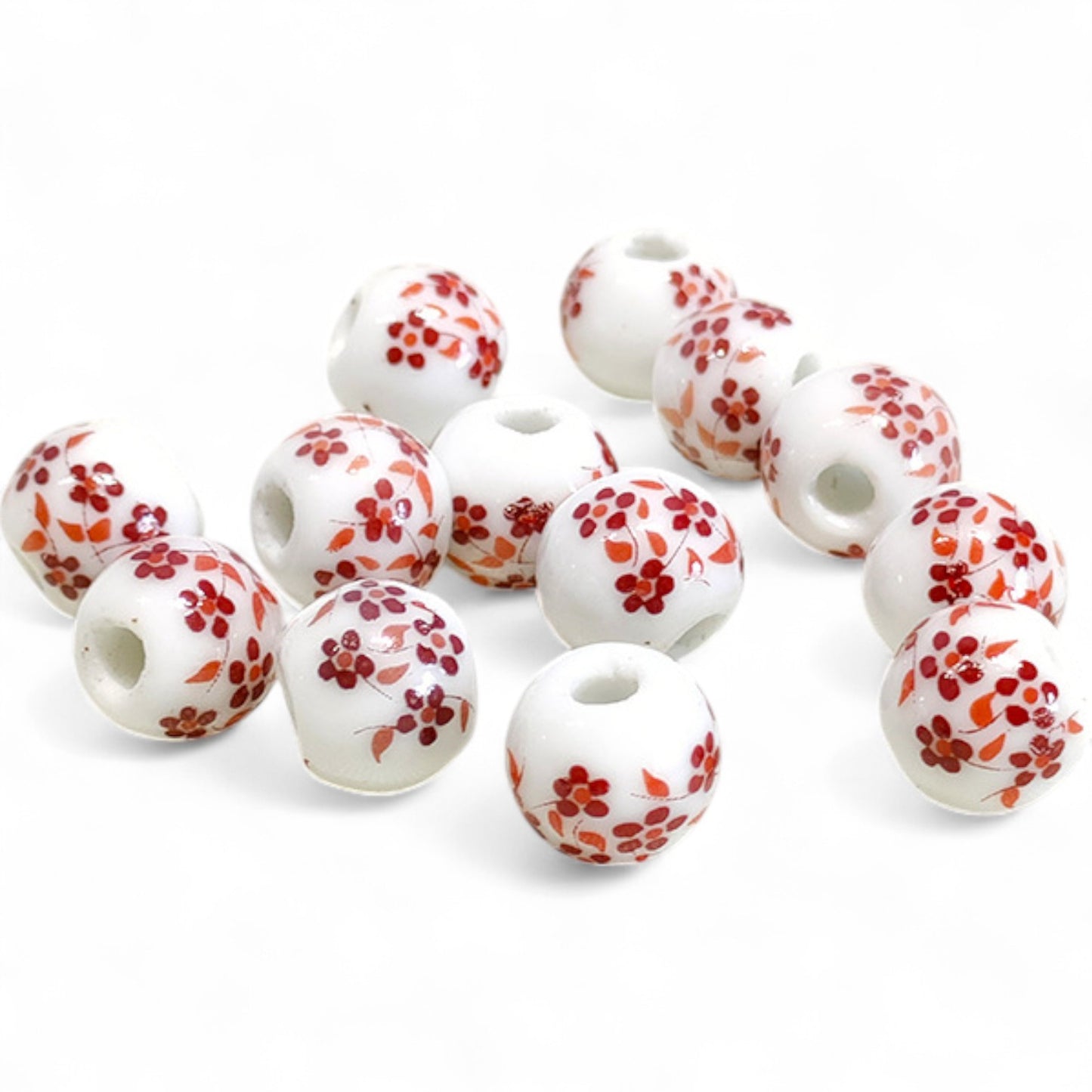x1 Perle en Céramique Blanche à Fleurs – Ø10 mm