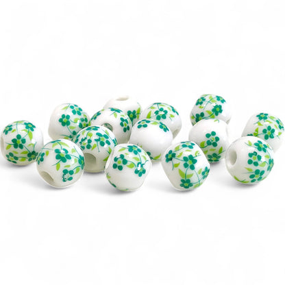 x1 Perle en Céramique Blanche à Fleurs – Ø10 mm
