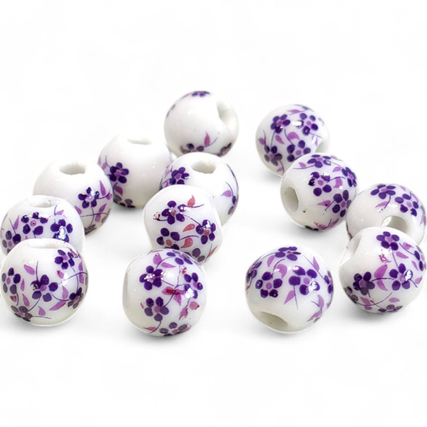 x1 Perle en Céramique Blanche à Fleurs – Ø10 mm