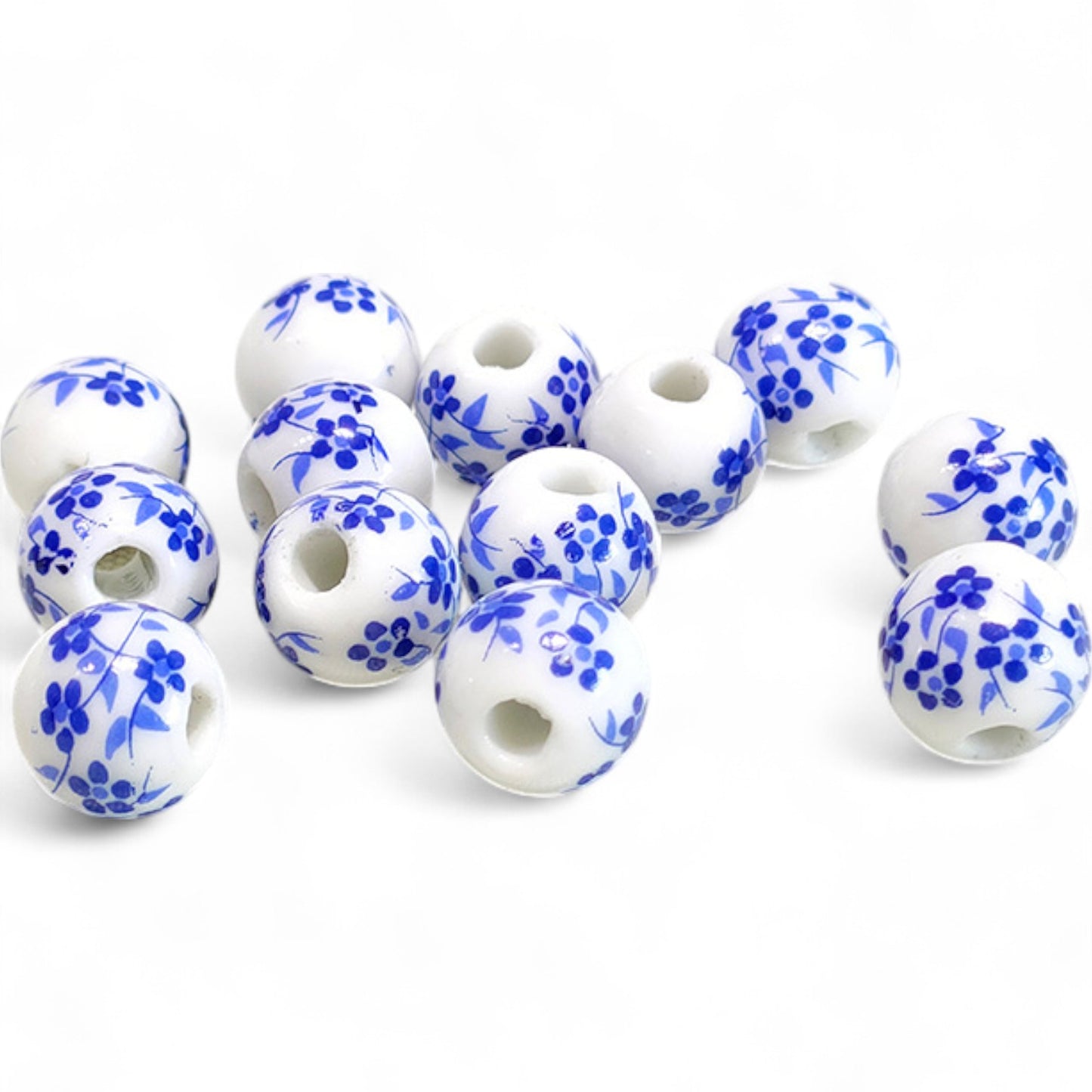 x1 Perle en Céramique Blanche à Fleurs – Ø10 mm