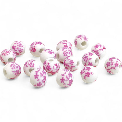 x1 Perle en Céramique Blanche à Fleurs – Ø10 mm