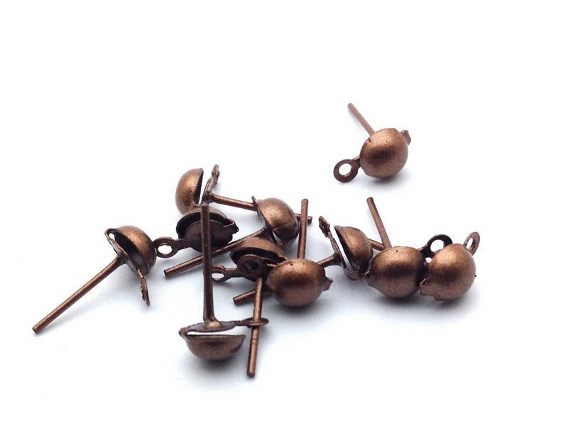 Clous d’oreilles à tête boule