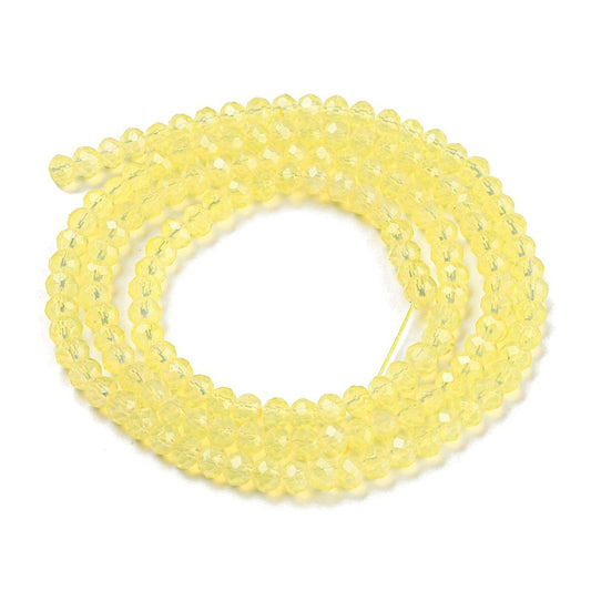 Fil de perles de verre transparentes imitation opaline – Facettes rondes – Jaune