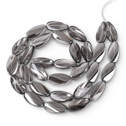 x1 Fil de Perles de verre électroplaquées – Ovales torsadées – Hématite