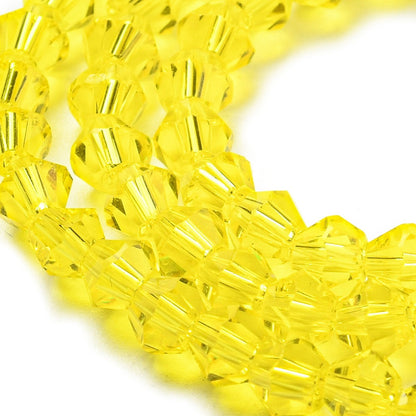 x1 Fil de Perles de Verre Transparentes Facettées – Biconiques 4 mm – Jaune