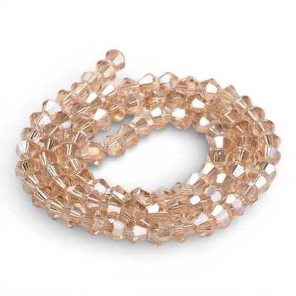 x1 Fil de Perles de Verre Transparentes Facettées – Biconiques 4 mm – Beige AB