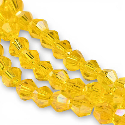 x1 Fil de Perles de Verre Transparentes Facettées – Biconiques 4 mm – Jaune Orangé AB