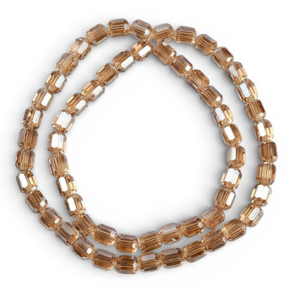 x1 Fil de Perles de verre électroplaquées – Cylindriques à facettes 9 x 7,5 mm – Champagne