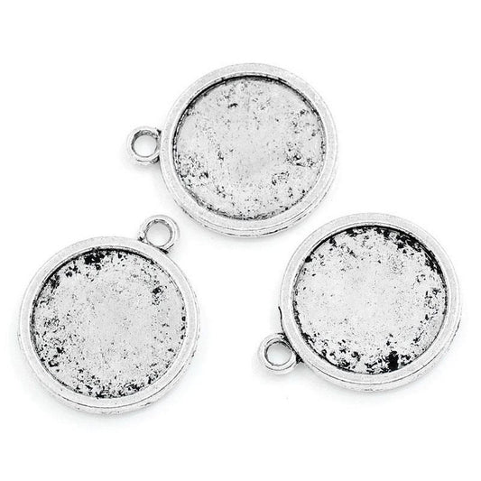 x1 Pendentif double face pour cabochon 20 mm – Métal argenté vieilli